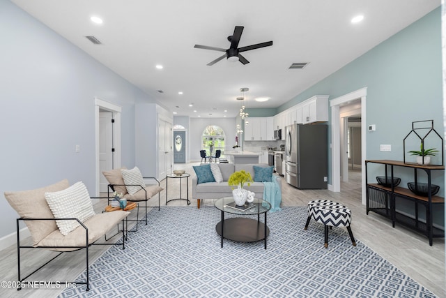 3064 Hickory Glen Dr, Jacksonville, FL 32065 - living area featuring ceiling fan, light wood-style flooring, recessed lighting, and baseboards