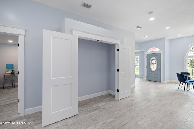 3064 Hickory Glen Dr, Jacksonville, FL 32065 - entrance foyer with plenty of natural light, light wood-type flooring, baseboards, and recessed lighting