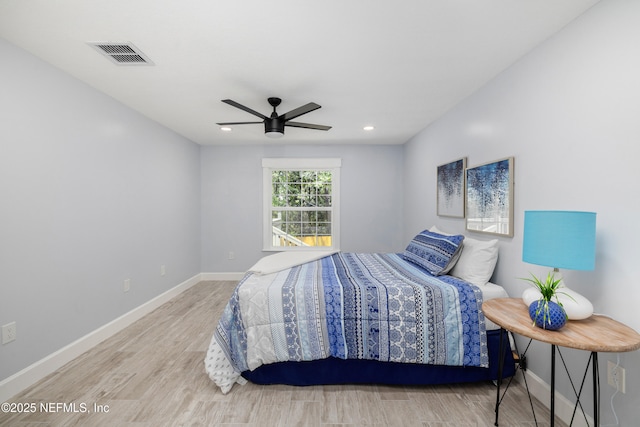 3064 Hickory Glen Dr, Jacksonville, FL 32065 - bedroom with wood finished floors, baseboards, a ceiling fan, and recessed lighting