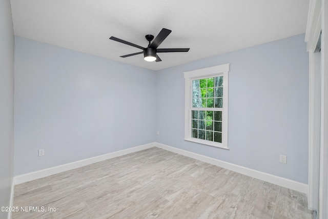 3064 Hickory Glen Dr, Jacksonville, FL 32065 - unfurnished room featuring wood finished floors, ceiling fan, and baseboards
