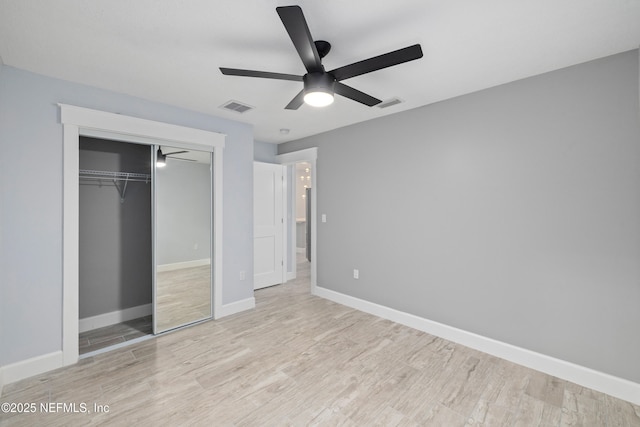 3064 Hickory Glen Dr, Jacksonville, FL 32065 - unfurnished bedroom with wood finished floors, a closet, baseboards, and ceiling fan