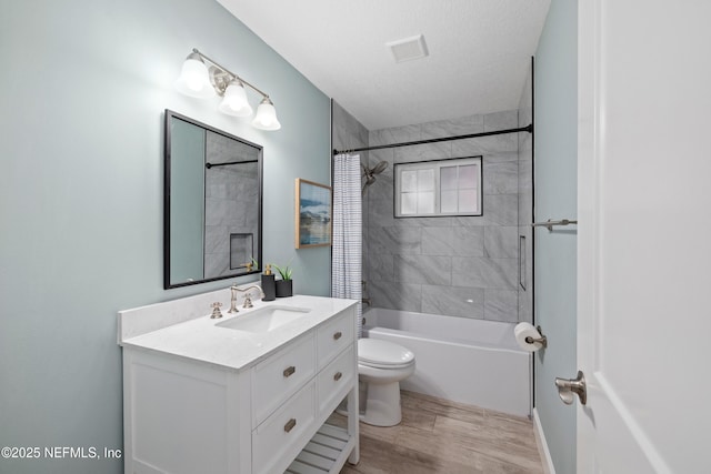 3064 Hickory Glen Dr, Jacksonville, FL 32065 - full bath with toilet, vanity, wood finished floors, and bathing tub / shower combination