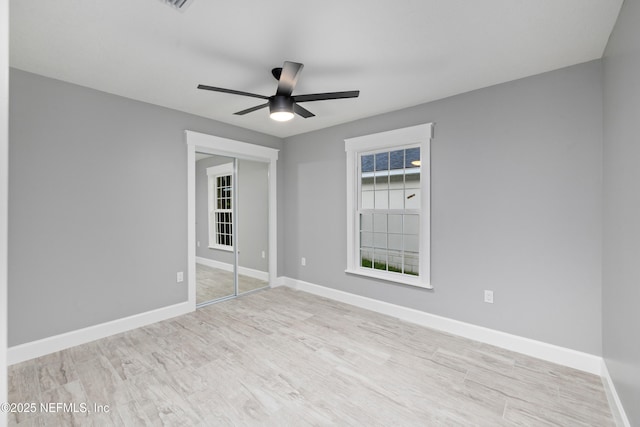 3064 Hickory Glen Dr, Jacksonville, FL 32065 - empty room featuring wood finished floors, ceiling fan, and baseboards