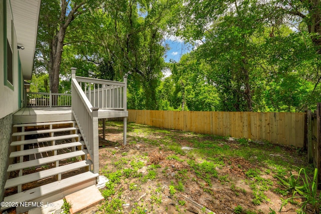 3064 Hickory Glen Dr, Jacksonville, FL 32065 - fenced backyard with stairway and a wooden deck
