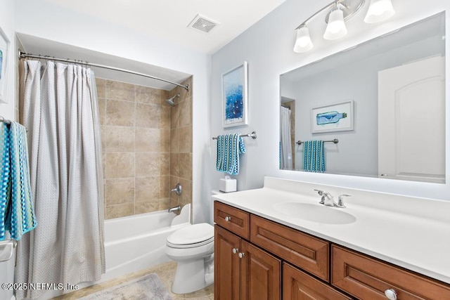 525 3rd St S Unit 513, Jacksonville Beach, FL 32250 - full bathroom featuring vanity, shower / bath combo with shower curtain, and tile patterned flooring