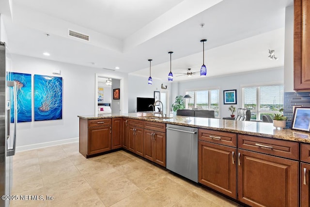 525 3rd St S Unit 513, Jacksonville Beach, FL 32250 - kitchen featuring stainless steel dishwasher, ceiling fan, brown cabinetry, and recessed lighting