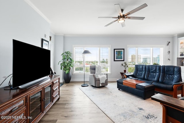 525 3rd St S Unit 513, Jacksonville Beach, FL 32250 - living room featuring ornamental molding, wood finished floors, and a ceiling fan