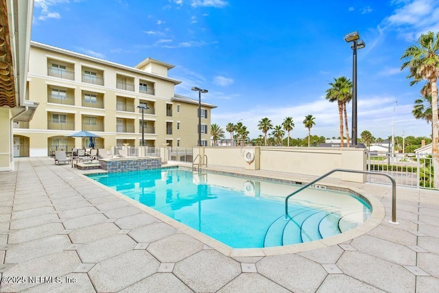 525 3rd St S Unit 513, Jacksonville Beach, FL 32250 - view of pool with a patio area