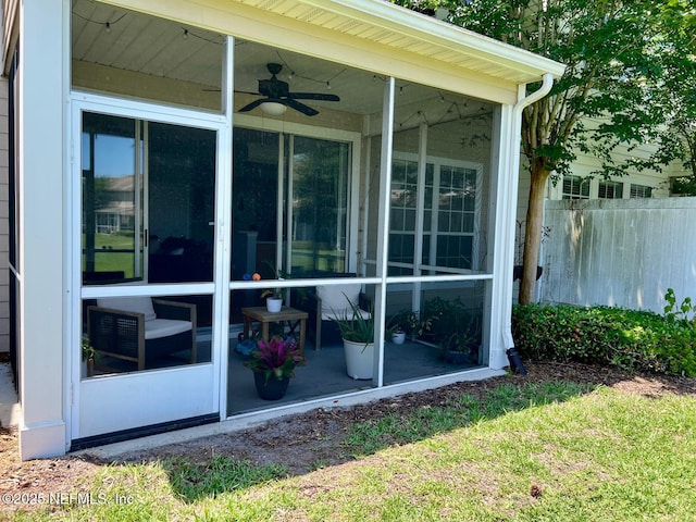 11110 Castlemain Cir S, Jacksonville, FL 32256 - view of side of home with a sunroom and ceiling fan