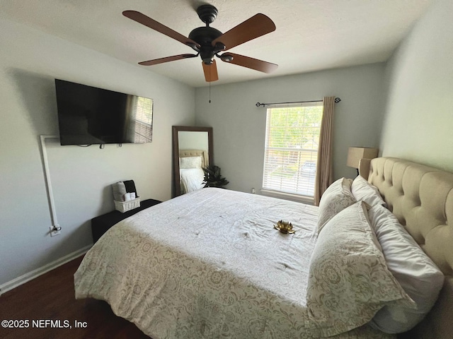 11110 Castlemain Cir S, Jacksonville, FL 32256 - bedroom featuring dark wood-style flooring and ceiling fan