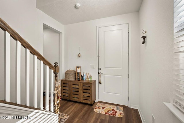 54 Torres Trce, Saint Augustine, FL 32095 - foyer entrance with wood finished floors, stairway, and a textured ceiling
