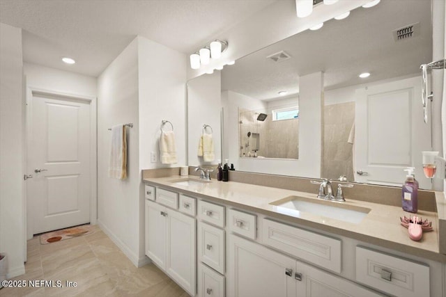 54 Torres Trce, Saint Augustine, FL 32095 - full bathroom featuring walk in shower, double vanity, and recessed lighting