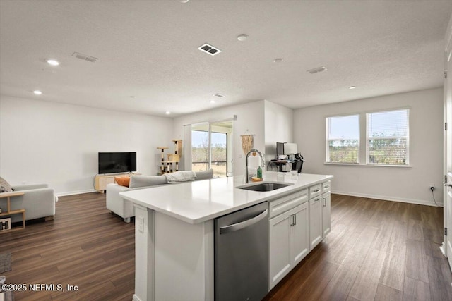 54 Torres Trce, Saint Augustine, FL 32095 - kitchen featuring dishwasher, open floor plan, dark wood-style floors, recessed lighting, and a kitchen island with sink