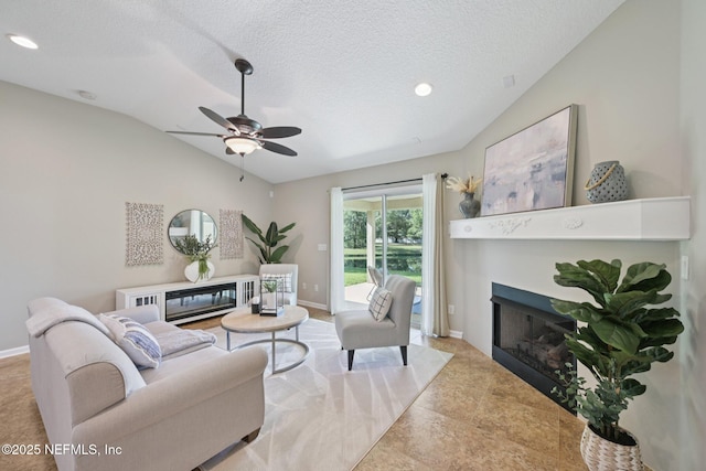 1804 Eagle Crest Dr, Fleming Island, FL 32003 - living room with a fireplace, lofted ceiling, a ceiling fan, a textured ceiling, and recessed lighting