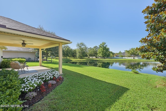 1804 Eagle Crest Dr, Fleming Island, FL 32003 - view of green lawn featuring a water view, ceiling fan, and a patio area