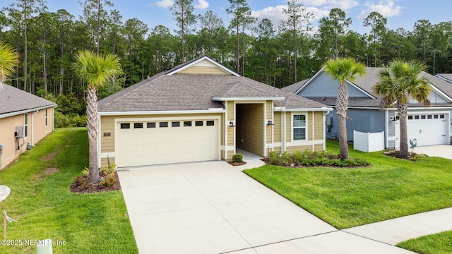 1382 Parkland Trl, Saint Augustine, FL 32095 - ranch-style house featuring a garage, driveway, a front yard, and a shingled roof