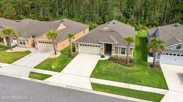 1382 Parkland Trl, Saint Augustine, FL 32095 - view of front of property with a front yard, driveway, and an attached garage