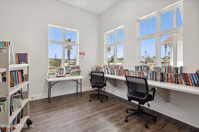 1382 Parkland Trl, Saint Augustine, FL 32095 - office area with wood finished floors, baseboards, and a towering ceiling