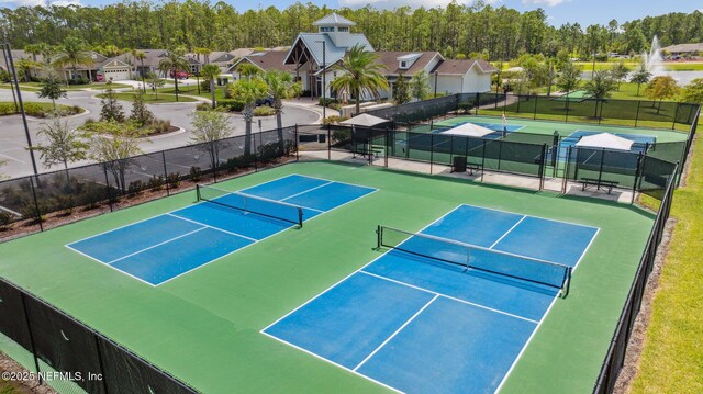 1382 Parkland Trl, Saint Augustine, FL 32095 - view of tennis court with a residential view