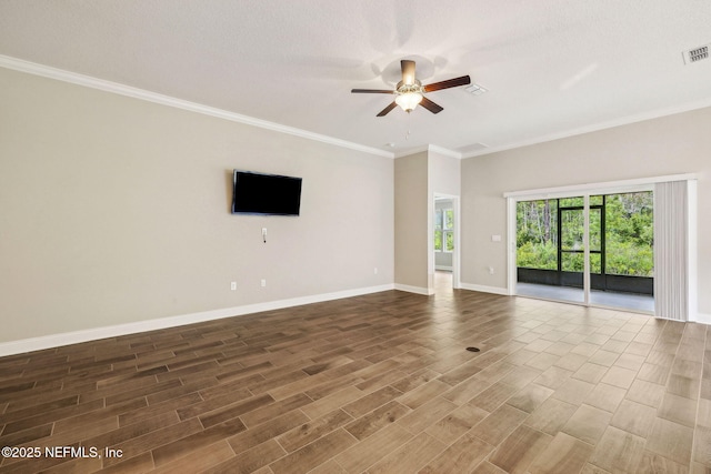 1382 Parkland Trl, Saint Augustine, FL 32095 - unfurnished room with ceiling fan, baseboards, wood finished floors, and ornamental molding