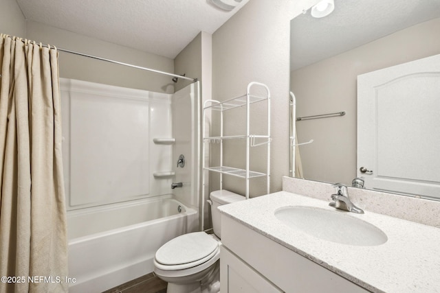 1382 Parkland Trl, Saint Augustine, FL 32095 - bathroom with shower / tub combo with curtain, toilet, vanity, a textured ceiling, and wood finished floors