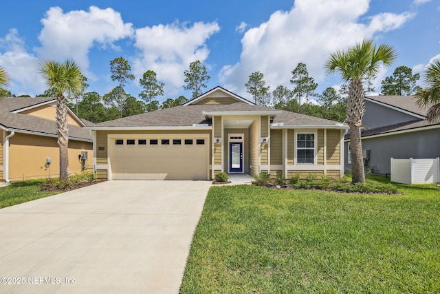 1382 Parkland Trl, Saint Augustine, FL 32095 - view of front of home featuring a garage, concrete driveway, and a front yard