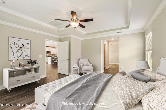 1382 Parkland Trl, Saint Augustine, FL 32095 - bedroom with a raised ceiling, dark wood-style floors, crown molding, and baseboards
