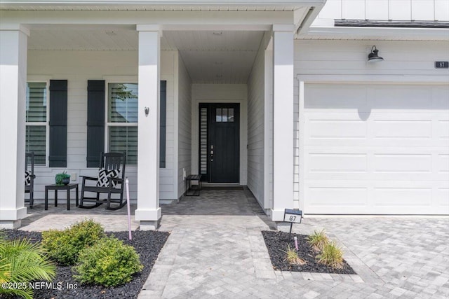 87 Tradesman Ln, Saint Johns, FL 32259 - entrance to property featuring an attached garage and covered porch