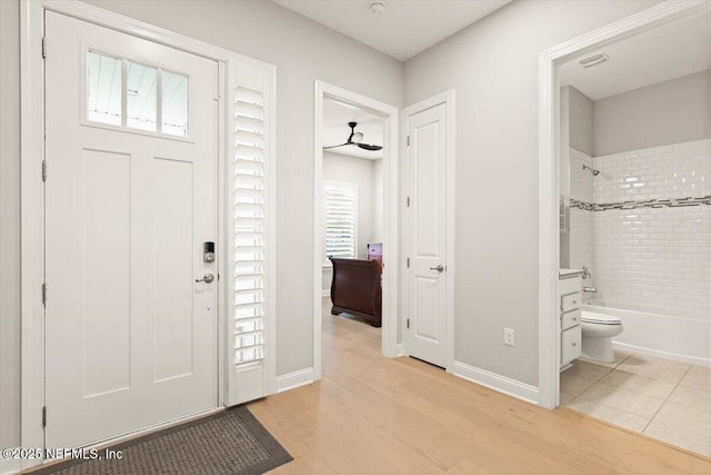 87 Tradesman Ln, Saint Johns, FL 32259 - entrance foyer with light wood-style flooring and baseboards