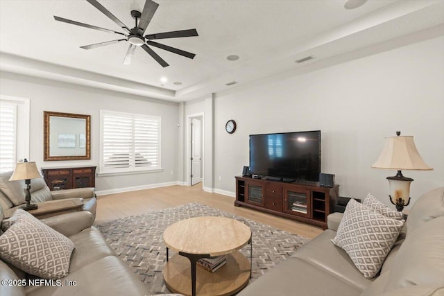 87 Tradesman Ln, Saint Johns, FL 32259 - living area featuring ceiling fan, light wood-style flooring, and a raised ceiling