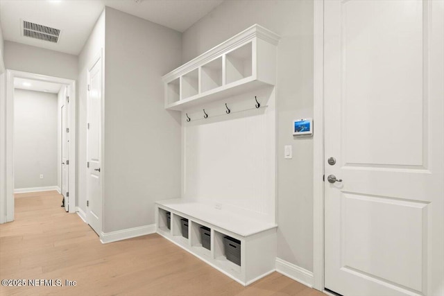 87 Tradesman Ln, Saint Johns, FL 32259 - mudroom with light wood-style floors and baseboards