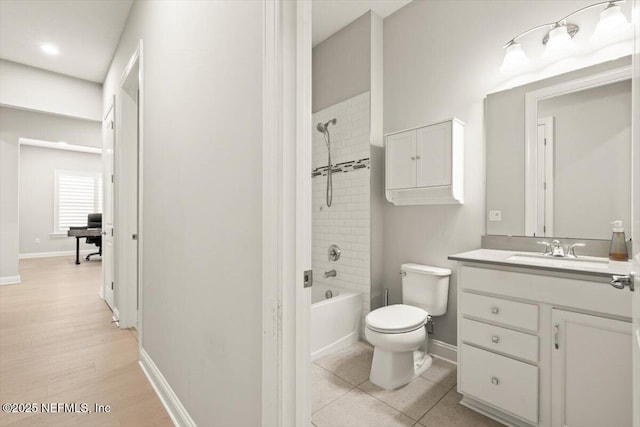 87 Tradesman Ln, Saint Johns, FL 32259 - bathroom with vanity, washtub / shower combination, and wood finished floors