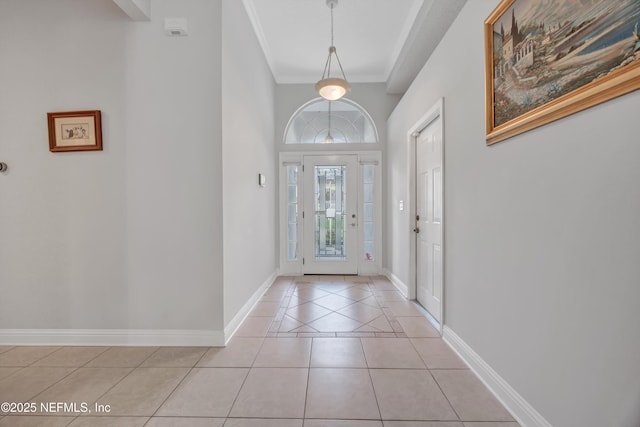 6542 Burnham Cir, Ponte Vedra Beach, FL 32082 - foyer featuring light tile patterned floors, baseboards, and crown molding