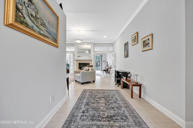 6542 Burnham Cir, Ponte Vedra Beach, FL 32082 - hallway featuring light tile patterned floors, crown molding, and baseboards