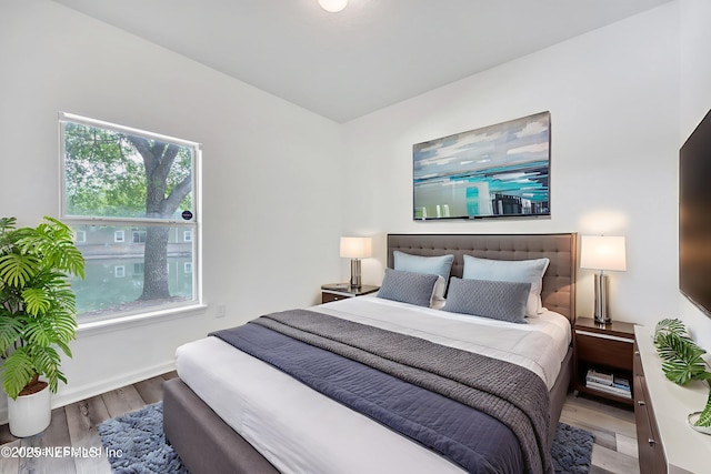 3641 Kirkpatrick Cir Unit 14-2, Jacksonville, FL 32210 - bedroom featuring wood finished floors and baseboards