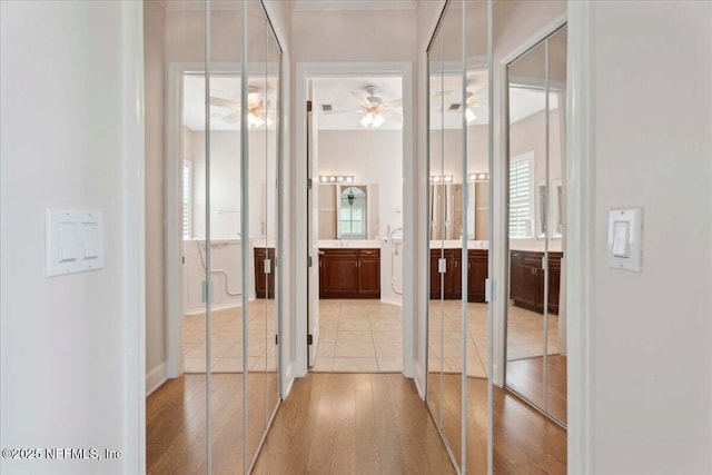 1327 Castle Pines Cir, Saint Augustine, FL 32092 - hall with light wood-style floors and ornamental molding