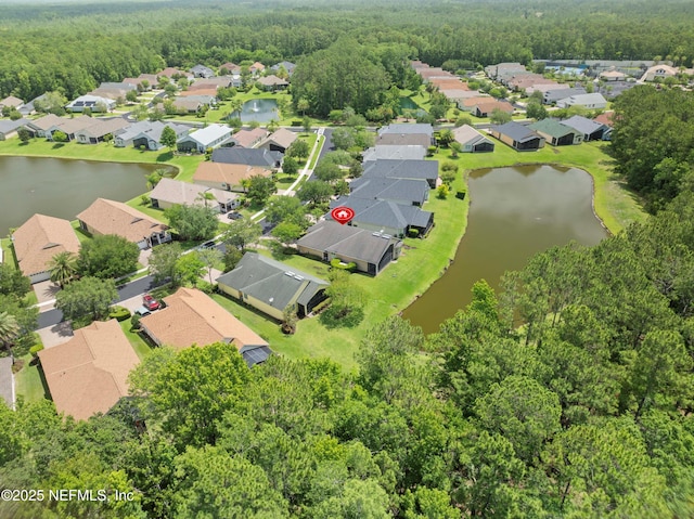 1327 Castle Pines Cir, Saint Augustine, FL 32092 - aerial view of residential area with a large body of water and a heavily wooded area