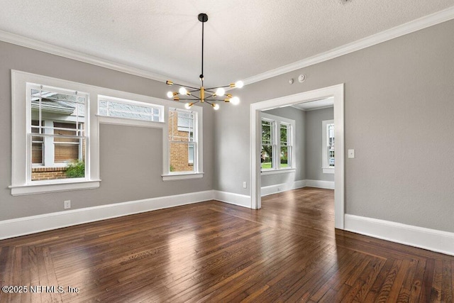 1032 Ingleside Ave, Jacksonville, FL 32205 - empty room with a chandelier, crown molding, wood finished floors, and a textured ceiling