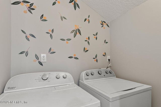 1032 Ingleside Ave, Jacksonville, FL 32205 - laundry area with a textured ceiling and washing machine and dryer