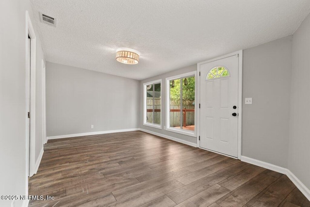 1032 Ingleside Ave, Jacksonville, FL 32205 - entrance foyer with wood finished floors and a textured ceiling