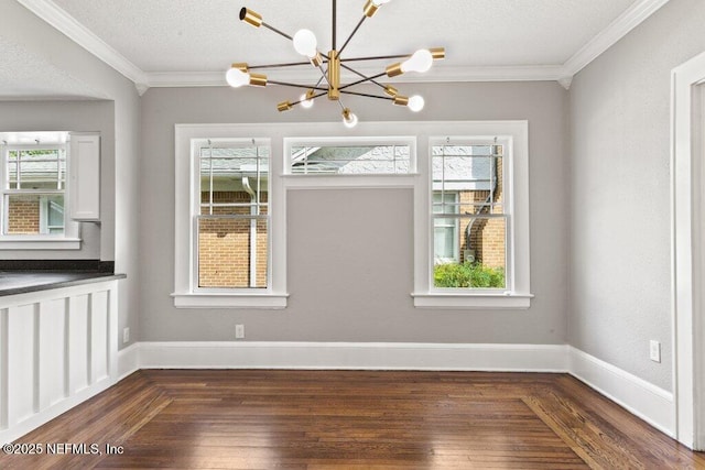 1032 Ingleside Ave, Jacksonville, FL 32205 - unfurnished dining area with ornamental molding, a chandelier, plenty of natural light, dark wood finished floors, and a textured ceiling