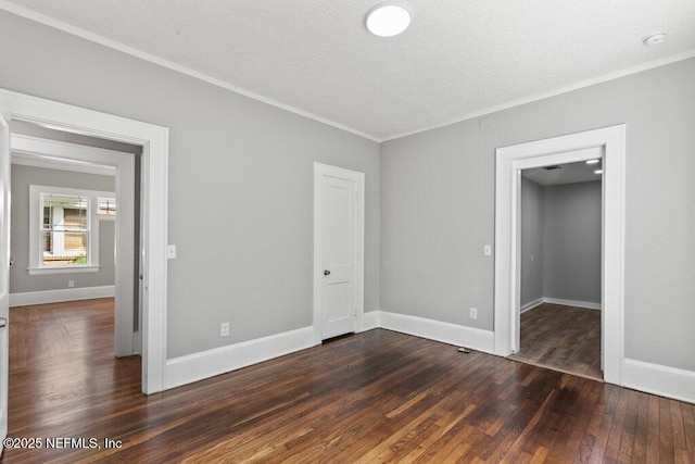 1032 Ingleside Ave, Jacksonville, FL 32205 - unfurnished room with ornamental molding, dark wood finished floors, and a textured ceiling