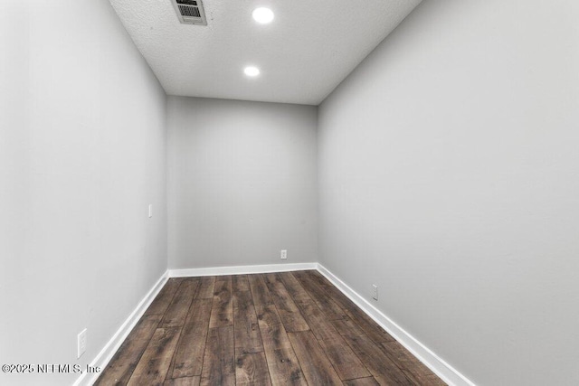 1032 Ingleside Ave, Jacksonville, FL 32205 - empty room with dark wood-style floors and recessed lighting