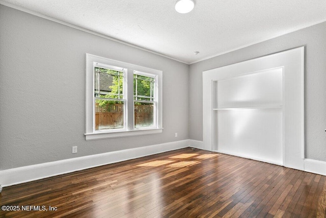 1032 Ingleside Ave, Jacksonville, FL 32205 - unfurnished room featuring wood-type flooring and a textured ceiling