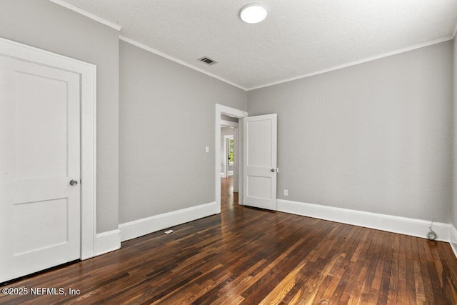 1032 Ingleside Ave, Jacksonville, FL 32205 - empty room with wood finished floors, crown molding, and a textured ceiling