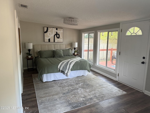 1032 Ingleside Ave, Jacksonville, FL 32205 - bedroom with dark wood-type flooring and a textured ceiling