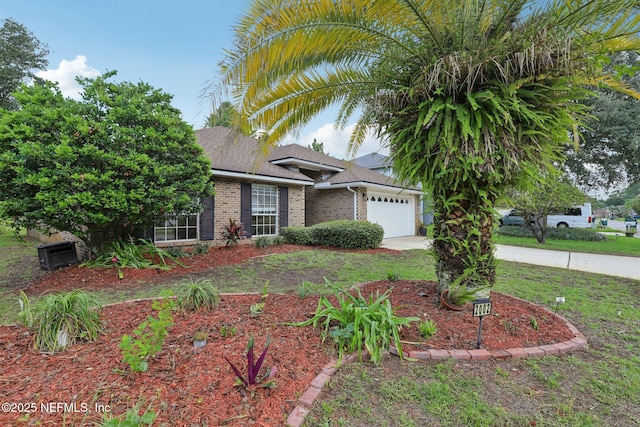 2002 Knottingham Trace Ln, Jacksonville, FL 32246 - view of front of home with a garage, brick siding, concrete driveway, and a front yard