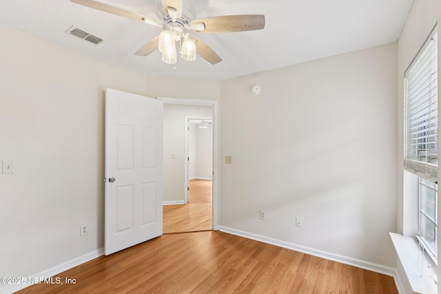 2002 Knottingham Trace Ln, Jacksonville, FL 32246 - unfurnished room featuring light wood-type flooring and ceiling fan