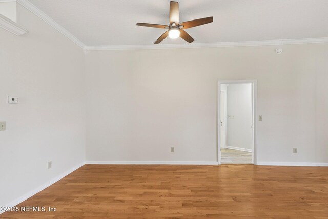 2002 Knottingham Trace Ln, Jacksonville, FL 32246 - empty room featuring a ceiling fan, light wood-style flooring, and ornamental molding