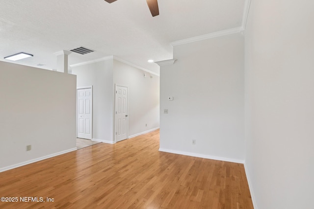 2002 Knottingham Trace Ln, Jacksonville, FL 32246 - spare room featuring ornamental molding, ceiling fan, and light wood-style floors